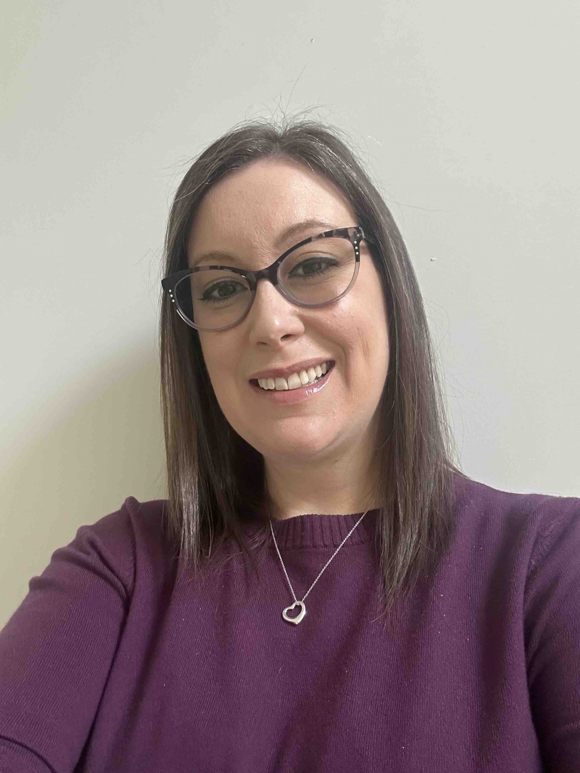Image of Susan Durnin wearing a purple sweater